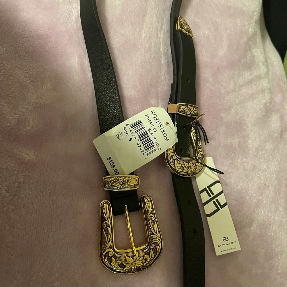 This is a gold/black belt completely new even has tag